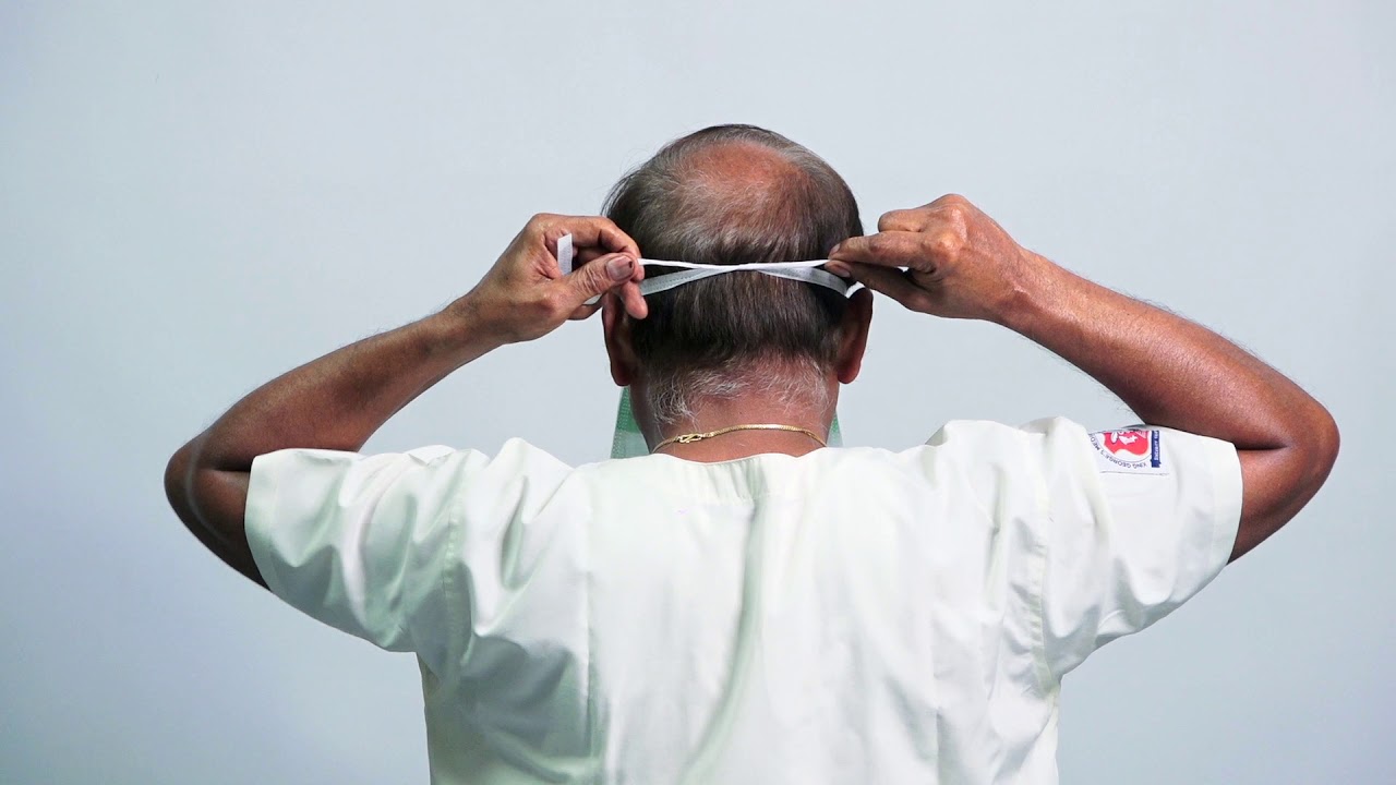 Donning of 3 layer  mask