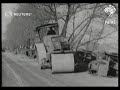 USA: America trys to improve road safety by barriers and crushing old cars (1935)