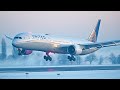Winter wonderland at brussels airport  close up landings and deice  from dark till sunshine