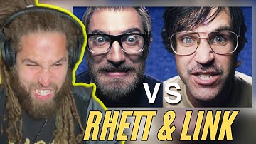Rapper Reacts to Epic Rap Battle: Nerd vs. Geek