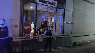Chicago police enter the Timberland store after looters strike