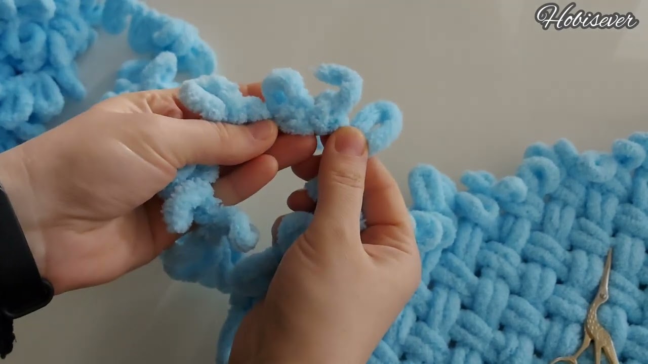 How to Make a Loop Yarn Blanket - Cutesy Crafts