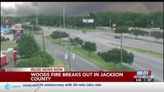 Fire crews work to contain East Jackson County woods fire