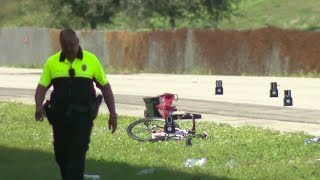 Woman riding bike killed in single car crash in Davie