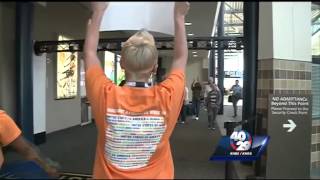How do associates get chosen for a trip to Walmart Shareholders Meeting?