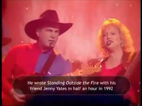 garth brooks standing outside the fire