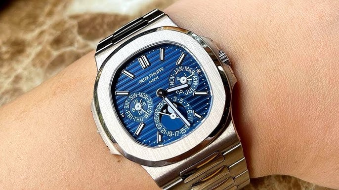 PATEK PHILIPPE, NAUTILUS, REF 5740/1G-001, WHITE GOLD PERPETUAL CALENDAR  BRACELET WATCH, MADE IN 2019, Important Watches, 2020