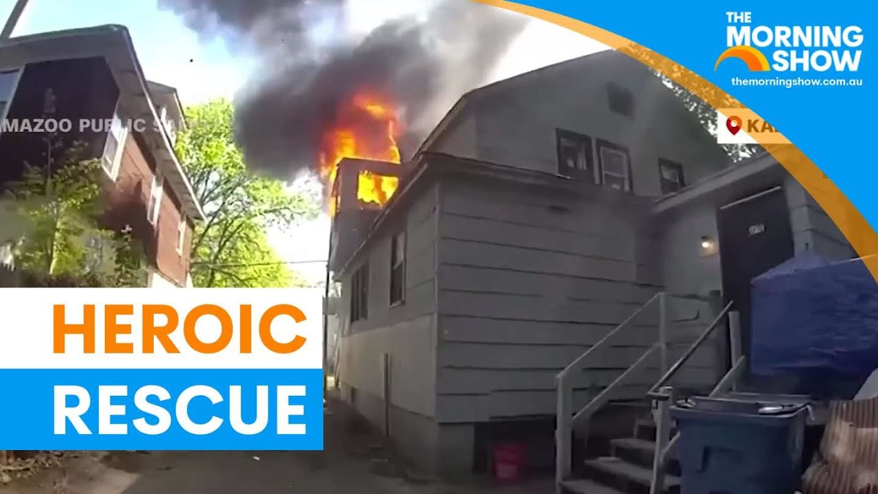 Hero officer catches baby dropped from burning building | The Morning ...