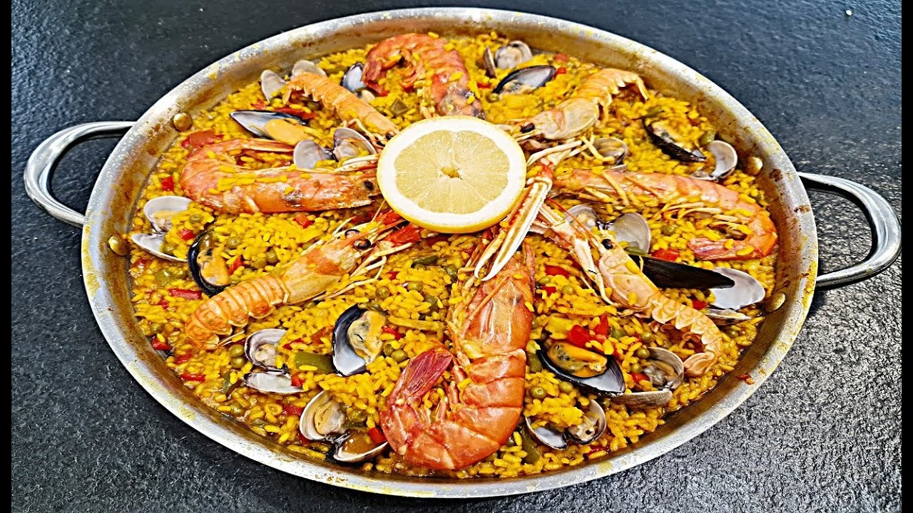 Arriba 77+ imagen paella valenciana receta original con mariscos