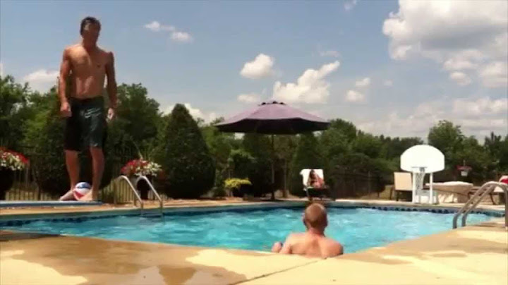 Amazing diving board backflip basketball trick shot!