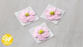 How to Add a Center to Icing Flowers | Wilton