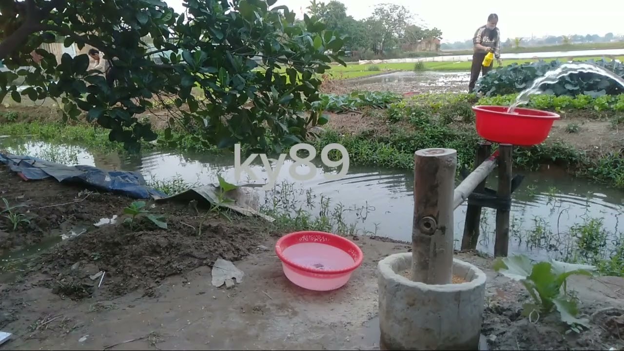 Farm life with a corn pounding mortar and pestle.
