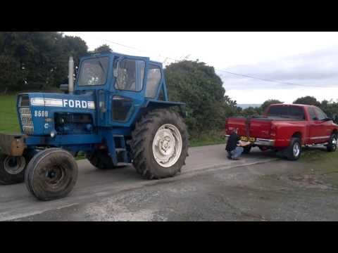 dodge ram cummins vs ford 8600 tractor tug of war