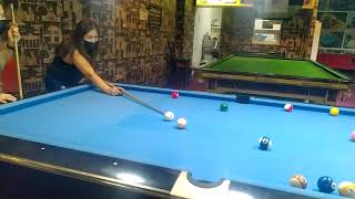 Playing billiards hehe we dont know hot to hit d balls