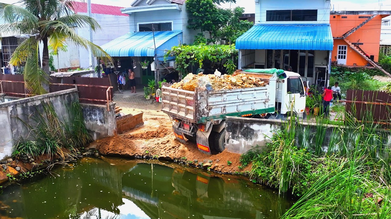 amazing landfill delete grass build school , truck transport soil stone , bulldozer old push soil