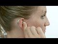 How to put on a moxi ric hearing aid