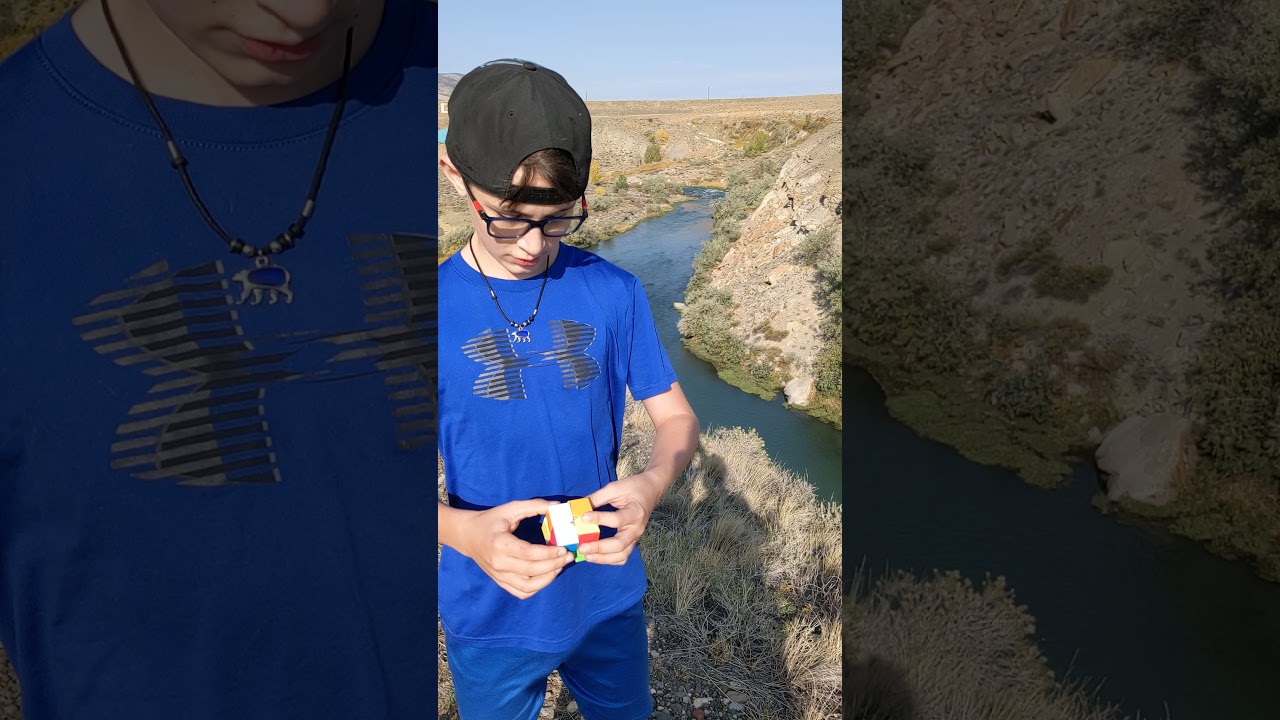 Solving the cube by the river.