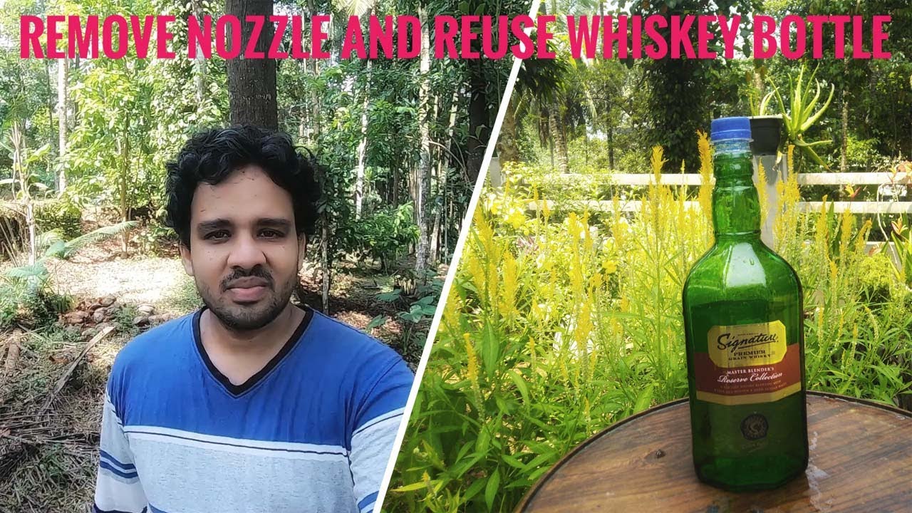 Remove nozzle of empty Whiskey bottle കാലി വിസ്‌കി കുപ്പിക്ക്