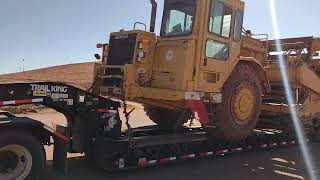 Marcos and Timmy hauling the 623F Cat  Scraper