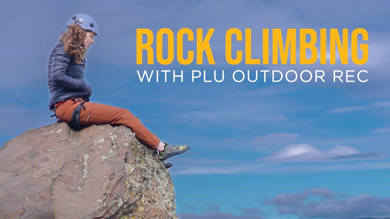 USA, Washington, Washington Pass. A Female Rock Climber Rappels To The