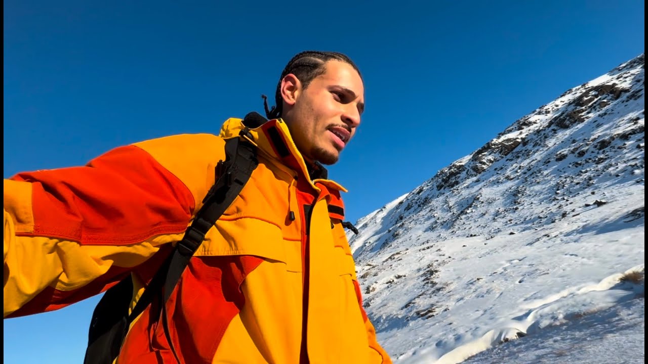 climbing up a snow mountain