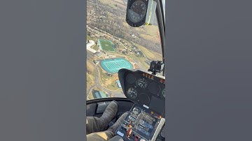 Flying over teal football field in R22 #helicopter #pilot #adventure #aviation #explore #travel #r22