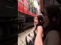 This girl placed a coin on the train track