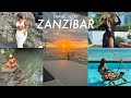 Zanzibar travel vlog swimming with turtlesstonetownskydivingclear kayakingmore