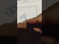 A cursive letter