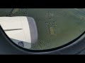 Plane takeoff and flight above the clouds from airport in ...