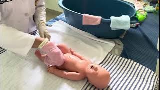 OSCE Memandikan Bayi