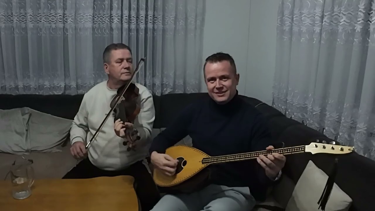 Imam dragu na daleku ,pjevaju otac i sin