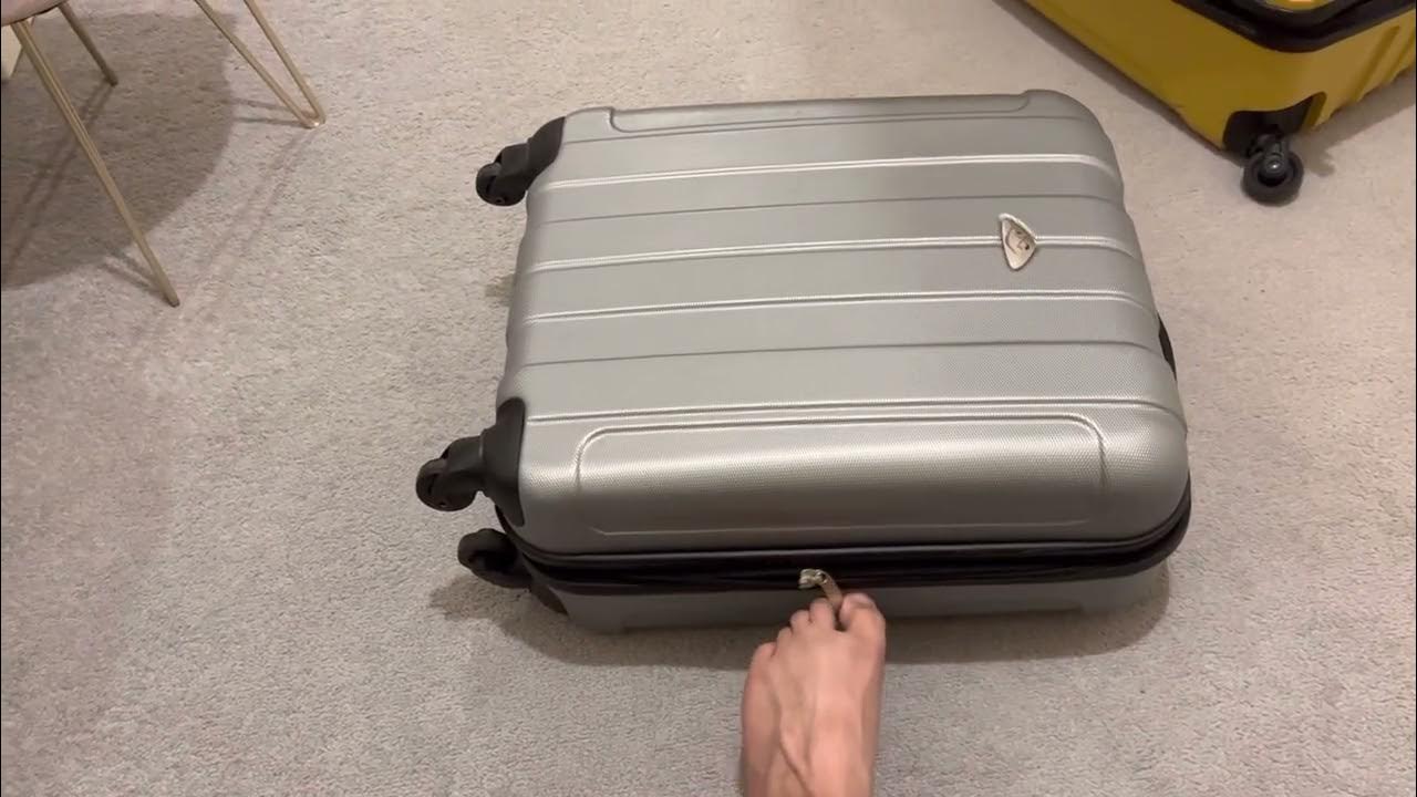 How to unzip a suitcase using your left foot! YouTube