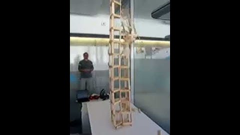 Slow motion big tower collapse
