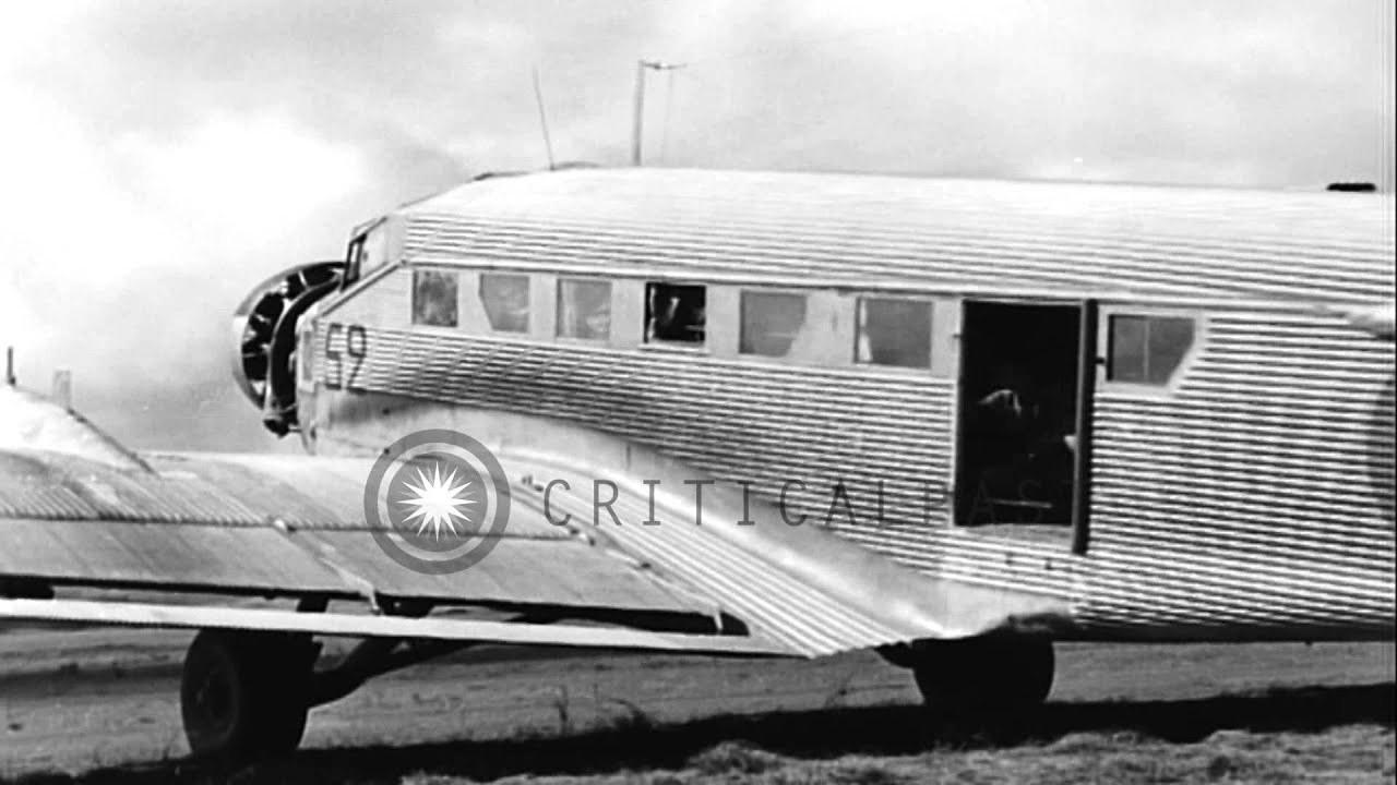 French paratroops jump from JU-52 (Amiot AAC 1 Toucan) aircraft during Indochina ...HD Stock Footage