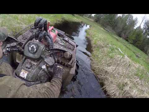 Polaris Sportsman 800 on portals floating on 34's 2wd