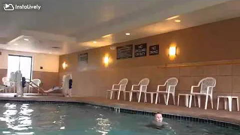 Mom and Gage swimming at the hotel