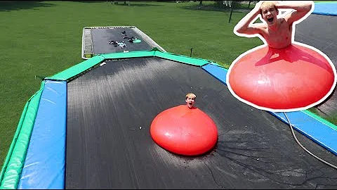 WORLDS BIGGEST WATER BALLOON VS WORLDS BIGGEST TRA...