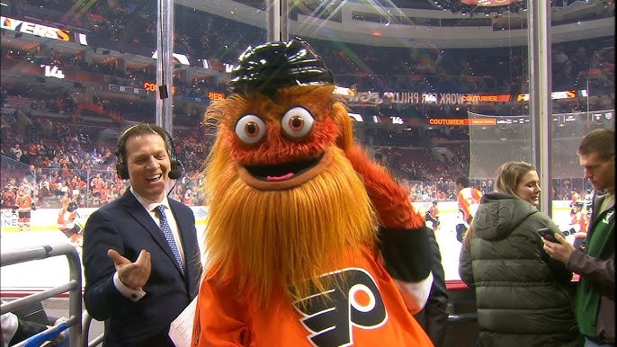 Philadelphia Flyers mascot Gritty waves to fans during the NHL All-Star  Game on Saturday, Feb. …