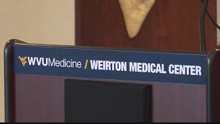 West Virginia Medical Center signs last documents to become a member of WVU Medicine