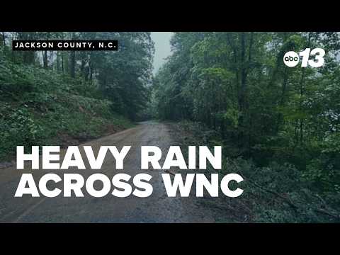 Heavy rainfall in western North Carolina downs trees, floods roads