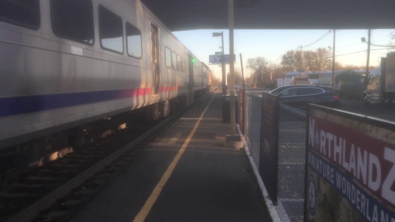 NJT 1610 departing at WoodRidge Station with NJT 4000 PL42AC after the