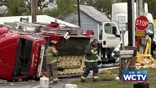 Two firefighters injured after crash between semi, firetruck in Madison County