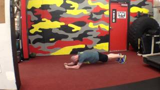 Plank Walkback with Sliders
