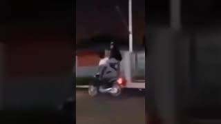 Motorcycle hits bump and...