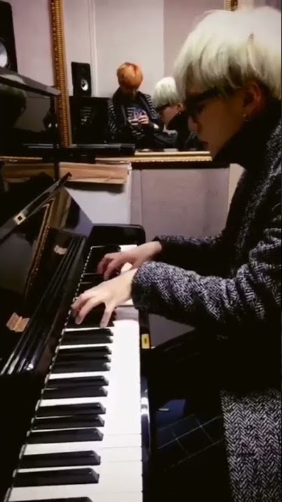 suga playing piano...