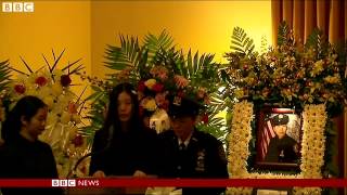 BBC News 5 January 2015 NYPD officers pay respects to Wenjian Liu