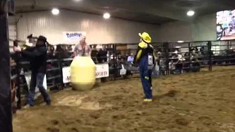Jody Seeley goes into a barrel