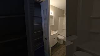 1 Bedroom Black Cabinets White App.