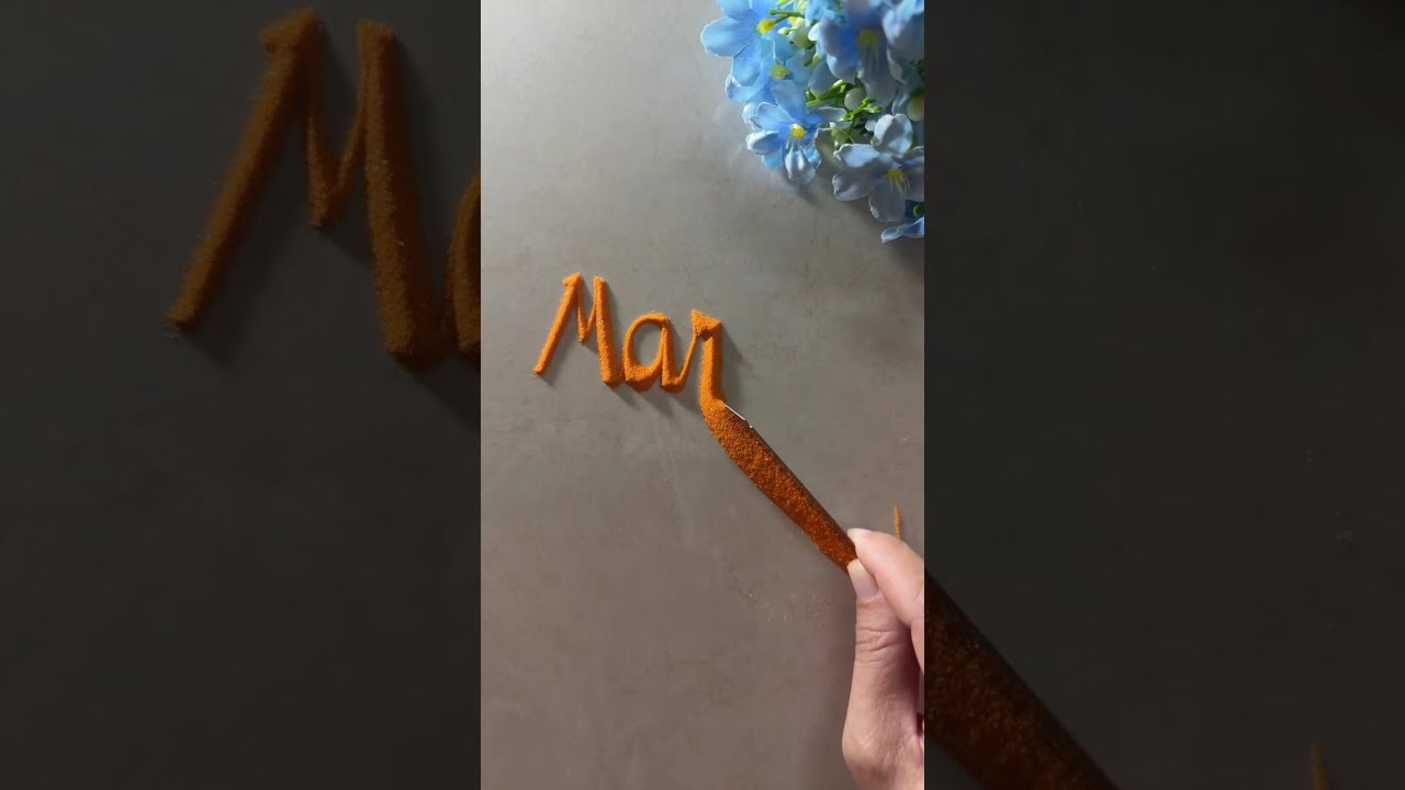 Name in sand art: writing your name in sand 